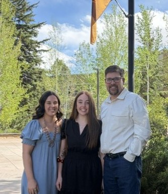 Paul Bankes with daughters Audrey and Julia at the University of Wyoming pinning ceremony